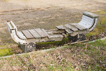 Image showing Old ruined with time outdoor bench