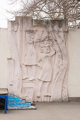 Image showing Vityazevo, Russia - March 14, 2016: bas-relief depicting two girls with grapes in hands of the House of Culture in the resort village Vityazevo, a suburb of Anapa