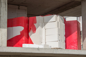 Image showing  Masonry blocks lie on the ceiling under construction house