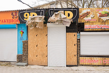 Image showing  Sukko, Russia - March 15, 2016: Closed during the offseason 9D pavilion with advertising inscription on the seaside street at the Black Sea in the village of Sukkah, a suburb of Anapa