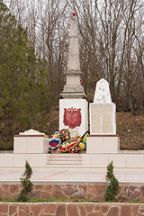 Image showing Sukko, Russia - March 15, 2016: A view of the common grave of Soviet soldiers and civilians in the village of Sukko, who died fighting Nazi invaders and state in the 1942-1943 year