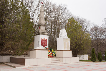 Image showing Sukko, Russia - March 15, 2016: A view of the common grave of Soviet soldiers and civilians in the village of Sukko, who died fighting Nazi invaders and state in the 1942-1943 year