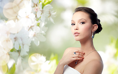 Image showing beautiful woman with earring, ring and pendant