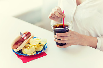 Image showing close up of woman drinking cola