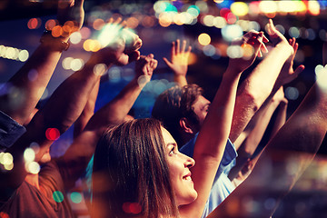 Image showing smiling friends at concert in club