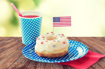 Image showing donut with juice and american flag decoration