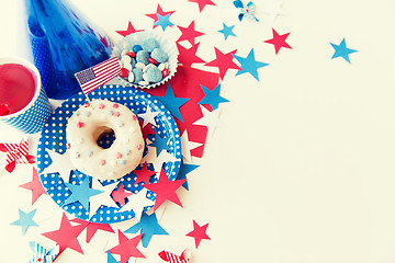 Image showing donut with juice and candies on independence day