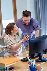 Image showing business team with smartphone in office