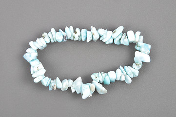 Image showing Splintered larimar chain on gray background