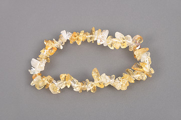 Image showing Splintered citrine chain on gray background