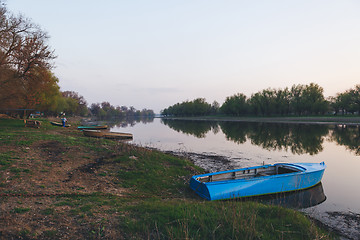 Image showing the boat was moored to the banks of the river