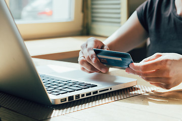 Image showing the girl is shopping on the Internet