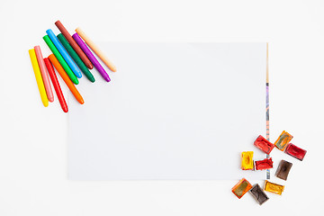 Image showing Colour pencils and watercolor  on paper blank isolated 