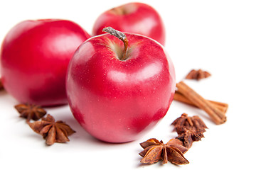 Image showing Christmas apples and spices on white background