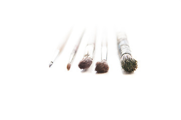 Image showing Dirty used paintbrushes 