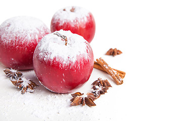 Image showing Christmas apples and spices on white background