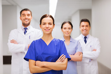 Image showing happy group of medics or doctors at hospital