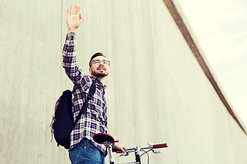 Image showing hipster man with fixed gear bike and backpack