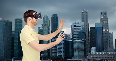 Image showing happy man in virtual reality headset or 3d glasses