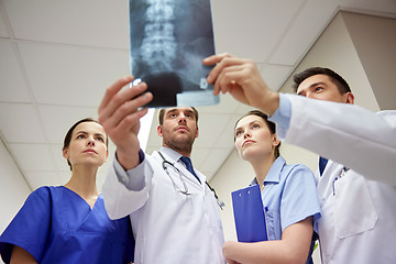 Image showing group of doctors looking at x-ray scan image