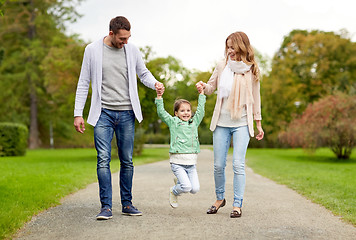Image showing happy family walking in summer park and having fun