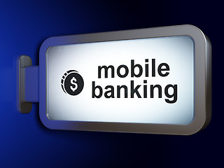 Image showing Currency concept: Mobile Banking and Dollar Coin on billboard background