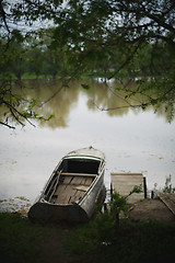 Image showing the boat was moored to the banks of the river