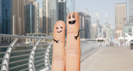 Image showing close up of two fingers with smiley faces