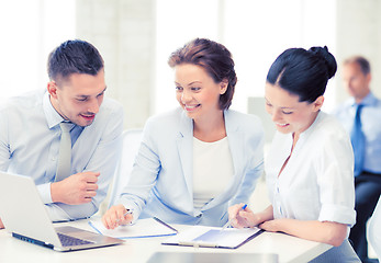 Image showing business team discussing something in office