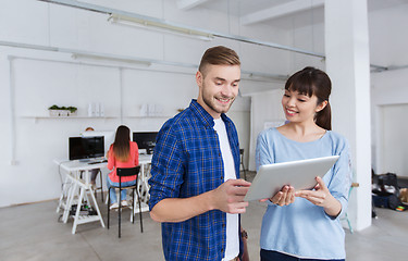 Image showing couple with smartphone and tablet pc at office