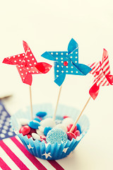 Image showing candies with pinwheel toys on independence day