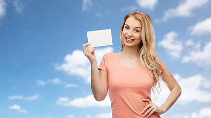 Image showing happy woman or teen girl with blank white paper