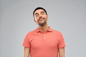 Image showing laughing man over gray background