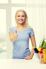 Image showing happy woman with vegetables showing thumbs up