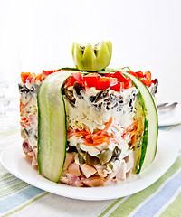 Image showing Salad with chicken and peppers on striped napkin