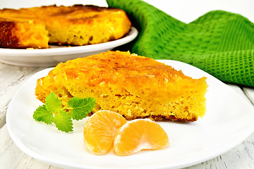 Image showing Pie mandarin with mint on board