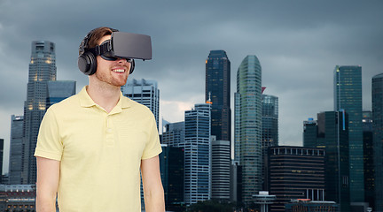 Image showing happy man in virtual reality headset or 3d glasses