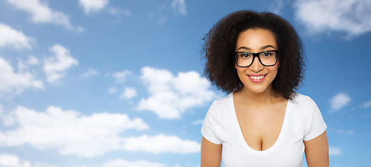 Image showing happy african woman or student girl in eyeglasses