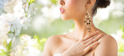 Image showing close up of beautiful woman with earrings