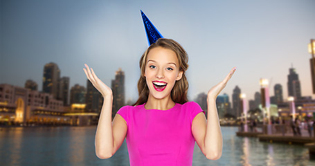 Image showing happy young woman or teen girl in party cap