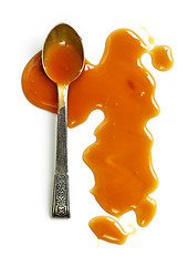 Image showing caramel sauce on white background