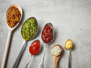 Image showing spoons of various sauces