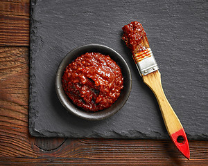 Image showing bowl of chili, tomato and garlic sauce