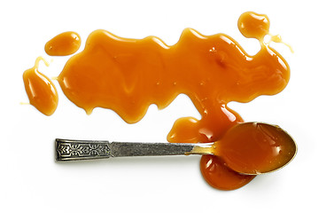 Image showing caramel sauce on white background