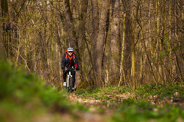 Image showing Mountain Bike cyclist riding single track