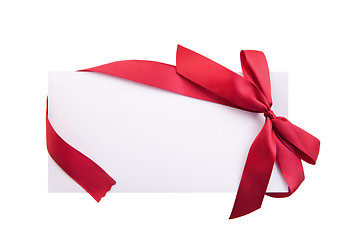 Image showing Card note with red ribbon on white background