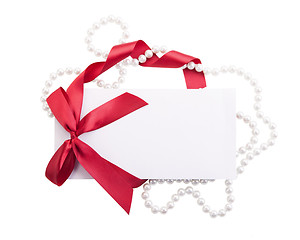 Image showing Card note with red ribbon on white background