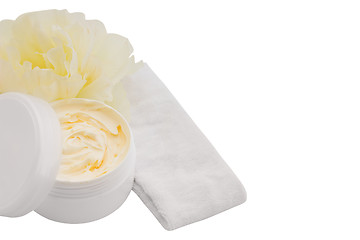 Image showing Spa cosmetic cream, headband and flower, isolated on white