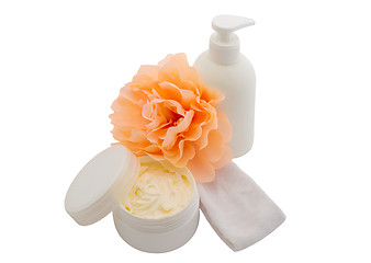 Image showing Spa cosmetic creams and flower isolated on white