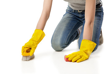 Image showing Woman with sponge and scrub brush isolated